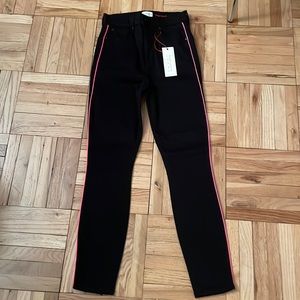 Alice and Olivia black denim jeans with hot pink piping